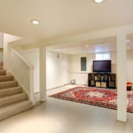 Refinished basement with new molding walls and stairs.