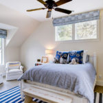 Remodeled bedroom with new walls and ceiling.